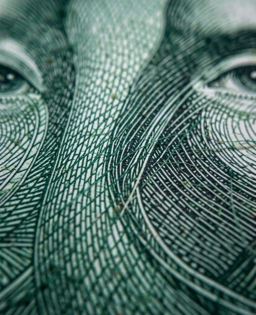 Textura macro de billete colombiano — referencia visual para duración de cookies